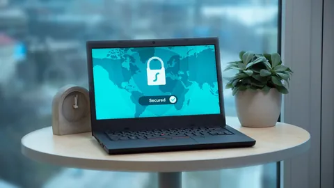 A laptop displaying a digital padlock security icon on its screen