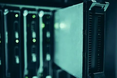 Rows of servers glowing in a data center